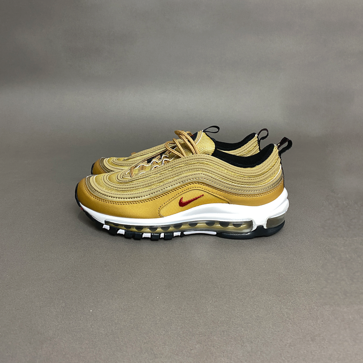 Tênis Nike Air 97 "Metallic Gold"