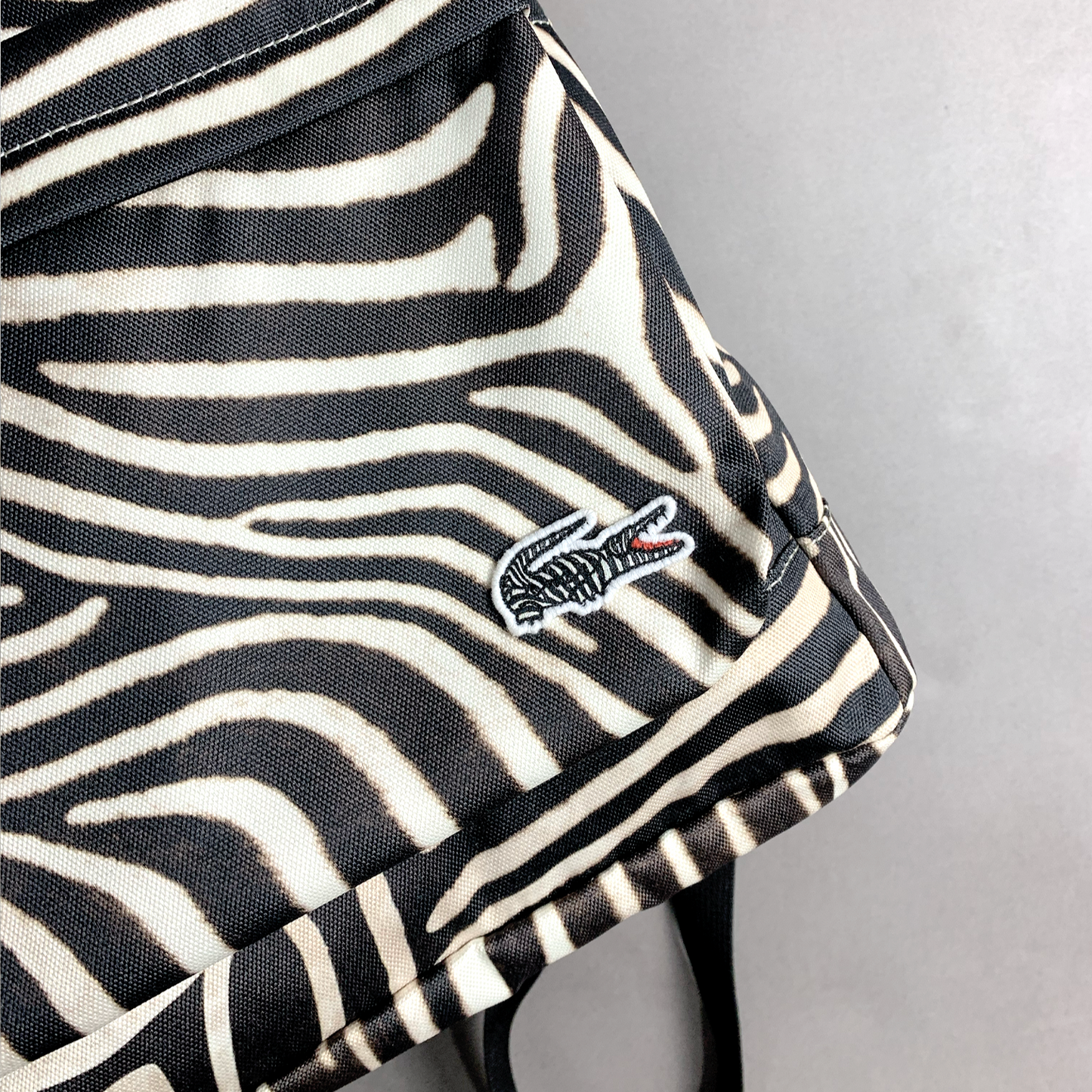 Mochila Lacoste x National Geographic Zebra